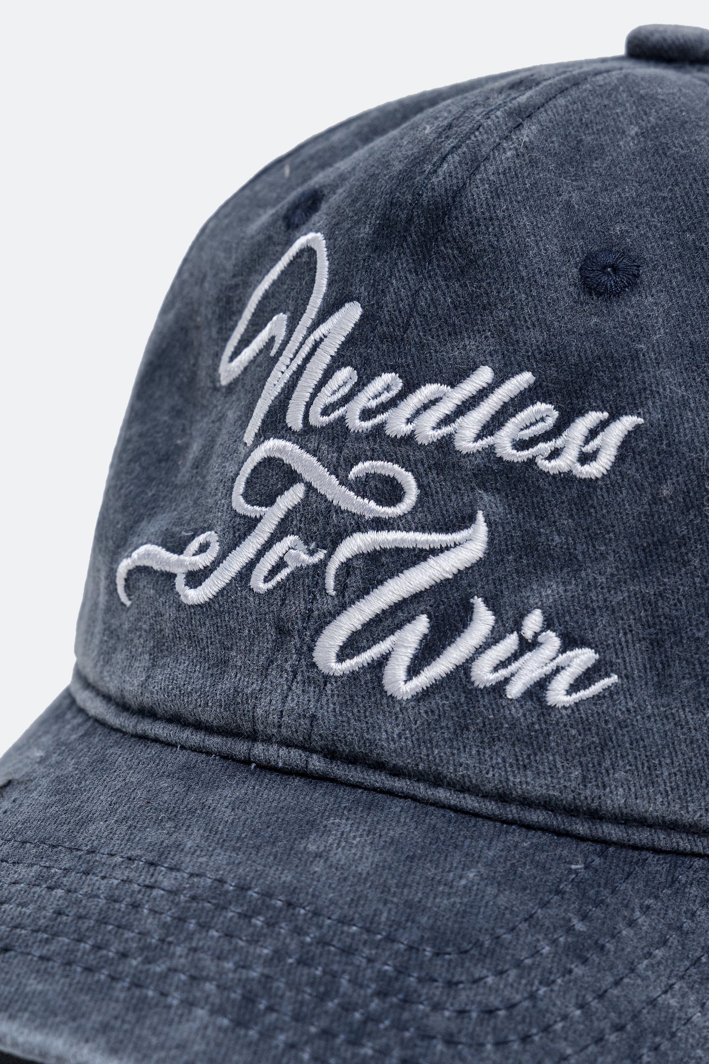 NEEDLESS TO WIN SLOGAN WASHED CAP / NAVY